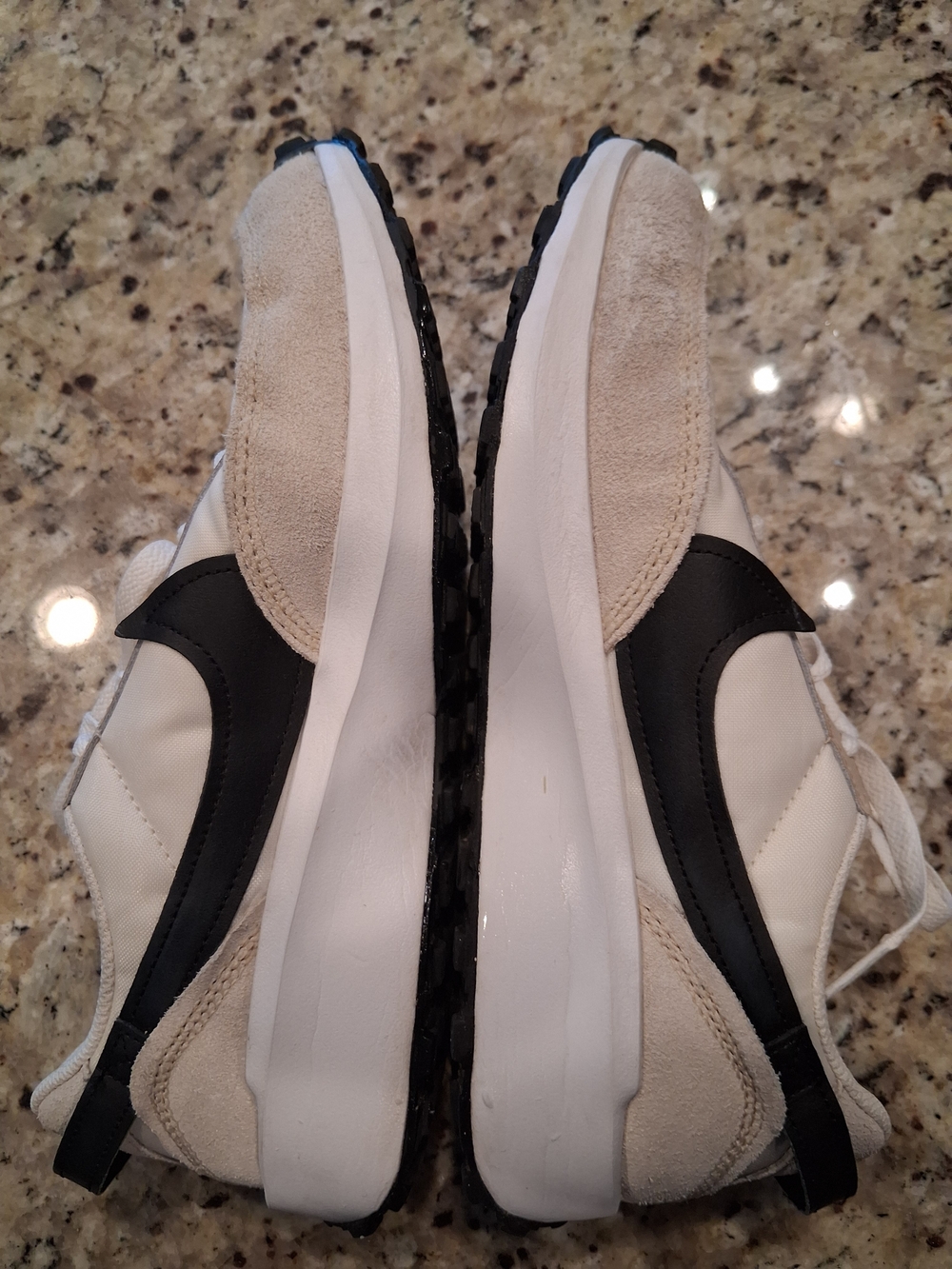 Nike Retro Runner Sneakers in White, Black, and Beige
